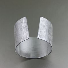 Linen Texturized Aluminum Cuff 10th Anniversary by johnsbrana Crystal Horn, Etsy Bracelets, Anodized Aluminum Jewelry, 10th Wedding Anniversary Gift, Aluminum Bracelets, Aluminum Earrings, Horn Pendant Necklace, Aluminum Jewelry, 10th Wedding Anniversary