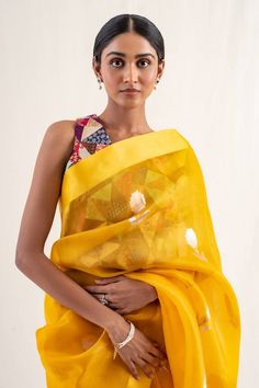 Deep yellow silk organza saree with gold floral buttis and solid border. Comes with an unstitched blouse piece. - Aza Fashions Transitional Yellow Chanderi Pre-draped Saree, Yellow Silk Blouse Piece, Gold Organza Traditional Wear With Unstitched Blouse, Gold Organza Saree With Unstitched Blouse, Transitional Organza Saree With Unstitched Blouse, Transitional Yellow Silk Blouse Piece, Organza Traditional Wear With Zari Weaving For Puja, Traditional Organza Wear With Zari Weaving For Puja, Diwali Kora Dupatta