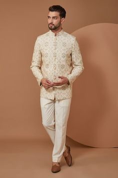 Ivory chanderi silk bandhgala with floral embroidery.
Components: 1
Pattern: Embroidery
Type Of Work: Floral
Neckline: Stand Collar
Sleeve Type: Full Sleeves
Fabric: Chanderi Silk
Color: Ivory
Other Details: 
Note: Pant worn by the model is not for sale
Occasion: Sangeet - Aza Fashions Bandhgala For Men, Groom Dress Men, Dress Men, Sequins Embroidery, Silk Embroidery, Groom Dress, Embroidered Silk, Embroidery Flowers, Embroidery Thread