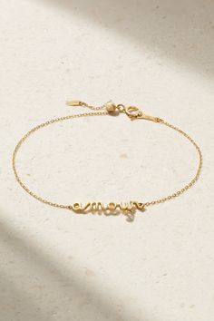 Persée's bracelet has been lovingly crafted in Belgium from 18-karat gold. The delicate chain supports a charm that spells out 'Amour' in cursive script and has a single diamond hanging below. It will make such a lovely anniversary or Valentine's Day gift. Gold Diamond Bracelet, Latest Bracelets, Cursive Script, In Cursive, Bracelets Gold Diamond, Delicate Chain, Fine Jewelry Bracelets, Diamonds And Gold, Diamond Bracelets