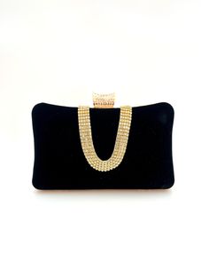 Introducing the ultimate statement piece for any special occasion - our velvet clutch bag with rhinestone closure and gold shoulder chain. This stunning accessory is the perfect finishing touch to any wedding outfit, cocktail dress or evening ensemble. The luxurious velvet material is soft to the touch and adds a touch of elegance and sophistication to any outfit. The satin lining ensures that your essentials are kept safe and secure. Take advantage of the perfect accessory for your next event - order yours today! The purse comes with a long gold strap. Cheap Black Pouch Evening Bag, Cheap Evening Bag With Chain Strap For Gift, Luxury Trendy Evening Bag With Adjustable Strap, Luxury Baguette Bag With Removable Pouch For Formal Events, Luxury Evening Shoulder Bag Rectangular Case, Luxury Clutch With Card Slots For Formal Events, Luxury Rectangular Shoulder Bag For Night Out, Luxury Formal Evening Bag With Detachable Strap, Luxury Party Satchel With Removable Pouch