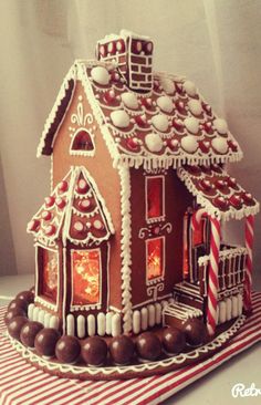 a decorated gingerbread house with candy and candies