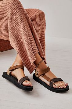 A fresh take on Teva's classic strappy sandals, this leather style features a slight platform sole in a luxe design.* Hook-and-loop closure* Lightweight design* Eva footbed Teva Outfit Summer, Teva Leather Sandals, Style Teva Sandals, Platform Tevas, 2 Strap Sandals