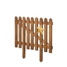 a wooden fence with a gold star on it's top and the bottom half