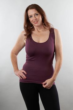 Solid Tank Tops With Built-in Bra, Stretch Tops With Built-in Bra For Layering, Everyday Solid Top With Built-in Bra, Yoga Tops With Built-in Bra And Scoop Neck, Stretch Scoop Neck Vest Top, Stretch Vest Top With Scoop Neck, Tank Top With Built-in Bra For Layering, Purple Camisole Top With Built-in Bra, Purple Stretch Tank Top