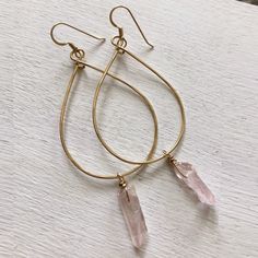 Handmade by Quinn Sharp Jewelry Designs in Humbolt County, CA, these hoops are made with 14kt gold filled wire. Hand-shaped and hammered. A natural Pink Crystal Drop hangs from the bottom of each hoop. Dimensions: Approx. 3" long including ear wire Hand Wrapped Gold Hoop Earrings, Gold Hand Wrapped Hoop Earrings, Gold Hand Wrapped Teardrop Earrings, Dainty Teardrop Wire Wrapped Hoop Earrings, Handmade Rose Gold Teardrop Hoop Earrings, Teardrop Wire Wrapped 14k Gold Filled Hoop Earrings, Teardrop 14k Gold Filled Wire Wrapped Hoop Earrings, Pink Gold Dangle Earrings With Ear Wire, Handmade Pink Teardrop Hoop Earrings