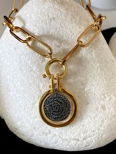 Buy an original Greek Pendant 22k Gold plated Phaistos Disk | Discover Greek Jewelry within a huge collection of Ancient Greek Jewelry | shipping worldwide This amazing piece of jewelry is representing the Ancient Greek Symbol so called Phaistos disc. An excellent gift for women and also for men that would love to wear a geometric symbol. Ideal present for someone who have already spent time in this beautiful island or he comes from this. Size The diameter of the big disc is 2.cm The thickness i Greek Silver Jewelry, Yellow Gold Metal Necklace With Detachable Pendant, Yellow Gold Metal Pendant Coin Necklace, Yellow Gold Metal Coin Pendant Necklace, Minimalist Coin Pendant Necklace, Handmade Yellow Gold Round Pendant Medallion Necklace, Handmade Yellow Gold Medallion Necklace With Round Pendant, Handmade Gold Plated Round Pendant Necklace, Handmade Gold Plated Chain Necklace With Round Pendant