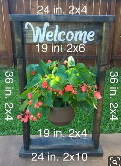 a welcome sign sitting on top of a wooden chair next to a flower pot filled with flowers