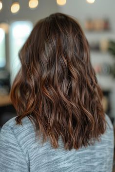 Rich fall brown hair with caramel highlights, adding warmth and contrast Hair Dimension, Brown With Caramel Highlights