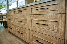 a large wooden dresser sitting in a kitchen