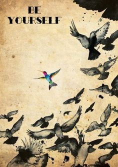 a flock of birds flying through the air next to each other on a dirty surface