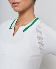 Jersey Polo in White with Green Trim The Jersey Polo is crafted with ultra-fine Italian yarn, making it lightweight and incredibly comfortable. Its new, classic style is chic and effortlessly stylish, making it the perfect addition to any sporting wardrobe. Pair with the matching skirt. Details & Features: Machine wash cold, lay flat to dry 4-way stretch 86% Viscose, 14% Nylon Yarn Making, Tennis Outfits, Skirt Details, Pickle Ball, Tennis Clothes, New Classic, Lay Flat, Classic Style, Winter Outfits