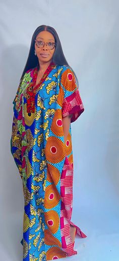 Ankara Cotton Kaftan maxi dress. It can be styled in different ways, you can dress it up with high heels or dress down with flats/sneakers. Other prints are also available, kindly start a conversation to ask for more information and pics.Contact us for custom looks and more style options. Sizing 🌺 Your height or desired kaftan length is needed. It is a free size but we still require your US/UK size and the length , and it can be adjusted/custom made depending on your height. (please indicate your size and height when you order).🌺 It is easy to wear, comfortable, and very stylish. Please do the following before completing your order;✅ Write your phone number to make shipping easier .✅ Include your height and measurements and other needed information. Please send us a message for further d Bohemian Red Maxi Dress With Vibrant Print, Colorful Pattern Dresses For Festivals, Casual Maxi Dress With Floral Print And Kimono Sleeves, Red Maxi Dress With Colorful Pattern For Vacation, Bohemian Red Maxi Dress With Colorful Pattern, Multicolor Maxi Dress For Beach Cover-up, Vibrant Red V-neck Maxi Dress, Red Dresses With Bold Print, Bohemian Bold Print Patterned Dress