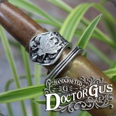 This is an adjustable wrap style ring featuring a Firefly design.A fantastic piece of original insect jewelry sculpted by yours truly, Doctor Gus! Wear this ring to make a bold statement everyday. Or get one to add that perfect final touch to your next cosplay. Each one is unique and sure to start a conversation!—————You will receive one Ring as pictured.Available in multiple sizes. Our rings are also adjustable. So you can pick your size and make that final adjustment for the perfect fit if you Handmade Adjustable Butterfly Ring, Adjustable Vintage Sterling Silver Butterfly Ring, Vintage Adjustable Sterling Silver Butterfly Ring, Unique Adjustable Open Butterfly Ring, Adjustable Nickel-free Butterfly Ring, Adjustable Nickel-free Antique Silver Rings, Adjustable Antique Silver Nickel-free Rings, Antique Adjustable Nickel-free Rings, Adjustable Metal Butterfly Ring