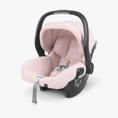 a baby car seat that is pink and black