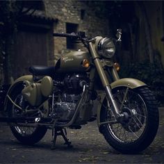 a motorcycle is parked in an alley way