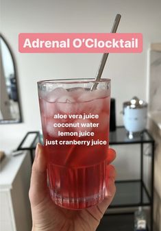 someone holding up a glass with ice and water in it that says, adrenal o'clocktail