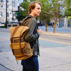 Hi, I'm the Rucksack! The Rucksack is a part of our sister collection, TimberWolf Trading Co! The Rucksack delivers on both style and function for the urban traveler or outdoor adventurer. Handcrafted with our signature waxed canvas and full-grain leather. The wax coating helps keep the water out. This rucksack features a branded fully-lined interior, multiple inner pocket to keep your items organized. Soft woven carry top handle and padded adjustable back strap offers extra comfort for everyday Suitcase Bag, Mommy Bag, Vintage Backpacks, Waxed Canvas, Passport Cover, Luggage Accessories, Garment Bags, Everyday Carry, The Urban