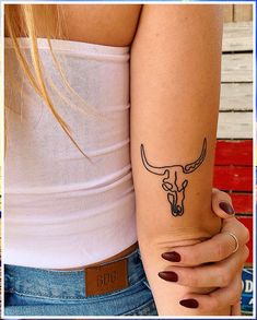 Show your appreciation for your baby with a clean and contemporary tattoo design. Western Tattoo Ideas, Tattoo Ideas Simple, Western Tattoo, Bull Skull Tattoos, Country Tattoos, Bull Tattoos, Taurus Tattoos