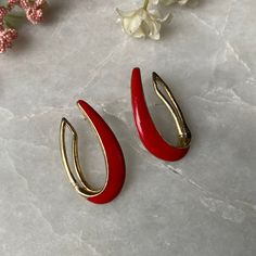 "Crown Trifari earrings Red enamel shaped like horseshoes Stamped inside rim * Has some discolorations on metal 1.5\" x 3/4\"" Red Pierced Hoop Earrings, Red Teardrop Hoop Earrings, Red Teardrop Hoop Earrings For Pierced Ears, Red Enamel Hoop Earrings For Gifts, Red Enamel Hoop Earrings Gift, Red Enamel Pierced Earrings, Red Pierced Enamel Earrings, Elegant Horseshoe Earrings For Gift, Red Enamel Drop Earrings