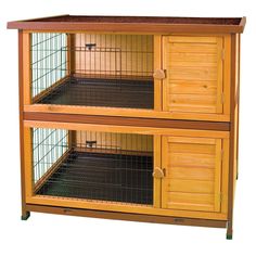 a large wooden bird cage with two doors and one door open on the side,