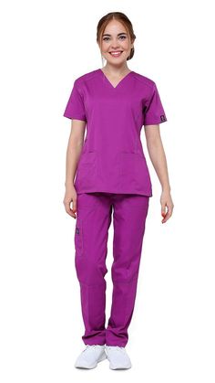 This Dress A Med women's scrubs set includes a double stitched v-neck top. It is perfect for comfort and room and can withstand normal wear and tear. The top has 2 square double stitched pockets and a cell phone pocket for storing both personal and professional items. We've made sure there is enough space for you to store it and it is durable. The top’s slim fit gives you a professional and streamlined look. It is made of a soft microfiber material so it is comfortable for everyone to wear.These Scrubs Style, Scrubs Women, Medical Scrubs Fashion, Graduation Dresses Long, Scrubs Nursing Uniforms, Slim Fit Cargo Pants, Scrub Style, Women's Uniforms, Hard Workers