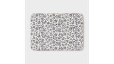 a white and black floral print square plate