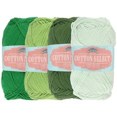 three skeins of cotton yarn in green, white, and light green colors