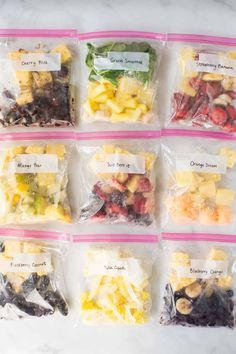 six plastic bags filled with different types of fruits and veggies in each bag