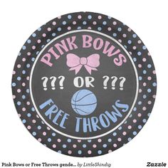 a pink bow is on top of a black paper plate with polka dots and a basketball