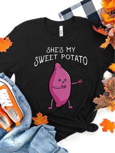 Product Name: Couples Black & Orange She's My Sweet Potato I Yam T-shirt For Thanksgiving, Christmas Gifts Item NO.: ZICO7839355764956 Weight: 0.2 kg = 0.4409 lb = 7.0548 oz Category: Clothing> Couple> T Shirts Tag: thanksgiving Creation Time: 2022-10-21 Story Of She is My Sweet Potato I YAMThe Ohio couple ���who are in She is My Sweet Potato Shirt and I YAM Shirt make the Intenet fall in love���She���s my sweet potato,��� the man���s shirt says. She posed, smiling and slightly leaning toward he Novelty Black T-shirt As A Gift, Novelty Black T-shirt As Gift, Novelty Black T-shirt For Gift, Gift Black T-shirt With Funny Text, Cute Black T-shirt With Funny Text, Fall Puns, Potato Shirt, Couple T Shirts, Christmas Gift Items