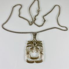 "70s vibes authentic vintage long silver-tone ornate pendant necklace  Marked  Measures chain 24\" pendant 2 1/4\" All of my items are either one-of-a-kind, vintage, gently worn or made in very limited quantities, so if something catches your eye, snap it up before someone else does." 70s Vibes, Long Statement Necklace, Vintage 70s, Pendant Necklaces, Jewelry Necklace Pendant, Silver Tone, Statement Necklace, Etsy Accessories, Accessory Gift