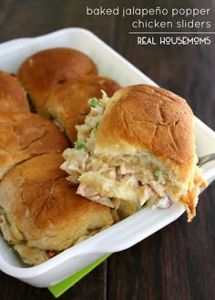 a close up of a sandwich in a container on a table