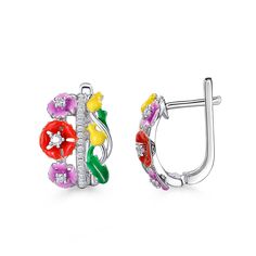 These earrings are cast from sterling silver in the shape of softly bloosm flowers. They're outlined with colorful enamel and dotted with white stones to emphasize the unique shape. These earrings are the epitome of springtime! Perfect for a fairy.Carat Weight: 0.586 ctStone Size: 1,1.7,2 mmNumber of Stones: 40 Stone Shape: RoundStone Color: Diamond WhiteWeight: 5.28 gWidth: 12.6 mmHeight: 18.9 mmThickness: 15.7 mmMaterial: 925 SilverStone Type: Jeulia® StonePlating Color: Silver Enamel Flower Charm Earrings, Enamel Flower Earrings With Flower Charm, White Diamond Flower Earrings Fine Jewelry, Flower Shaped Enamel Jewelry For Pierced Ears, Multicolor Flower-shaped Jewelry With 3d Flowers, Elegant Silver Enamel Flower Earrings, Multicolor 3d Flower Shaped Jewelry, Silver Flower Enamel Earrings, Silver Enamel Flower Earrings For Pierced Ears