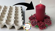 an egg carton with roses and a candle