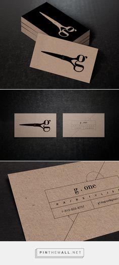 some business cards with scissors on them