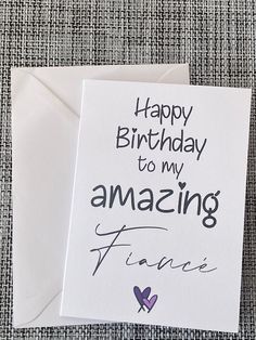 a greeting card with the words happy birthday to my amazing friend on it and an envelope