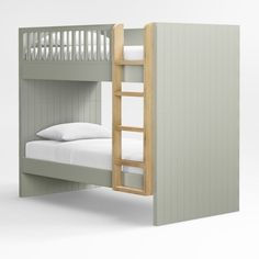 a bunk bed with a ladder next to it and pillows on the bottom floor, against a white background