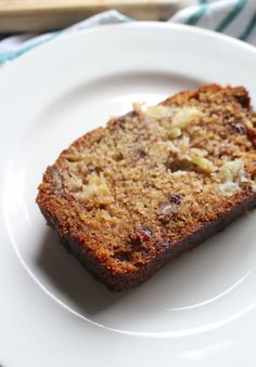 a piece of bread on a white plate