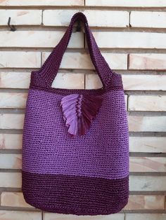 Women's bag crocheted from viscose raffia in color purple and burgundy vine. Raffia is a natural, environmentally friendly, biodegradable and hygroscopic material. The bag is stylish, comfortable, roomy, light and very durable, it will last more than one year. For the season spring-summer. Dimensions: wide 32 cm height 31cm base width 8 cm strap length 47 cm (2 straps) Care: Do not wash. Wipe it with a clean damp cloth. In case the bag is wrinkled or out of shape, you can steam it with an iron a Purple Crochet Tote Shoulder Bag, Daily Use Purple Crochet Bag, Bohemian Crochet Bag In Purple, Bohemian Purple Crochet Bag, Bohemian Purple Crochet Bag For Daily Use, Purple Bohemian Crochet Bag For Daily Use, Purple Tote Bag With Braided Handles, Purple Bags With Braided Handles For Daily Use, Purple Shoulder Bag With Braided Handles For Shopping