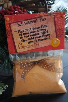 a bag of hot waffle mix sitting on top of a table next to a christmas tree