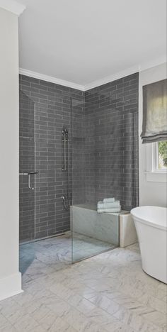 Zero-entry shower with gray subway tile and a waterfall bench Zero Entry Walk In Shower Ideas, Level Entry Shower Ideas, Waterfall Shower Bench, Zero Entry Shower Master Bath, Zero Entry Shower Ideas, Waterfall Bench, Shower Makeover, Tile Walk In Shower, Bathroom 2024