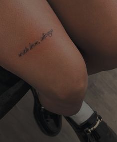 a woman's thigh with the words, with love always written on it in cursive font