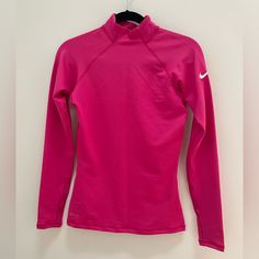 New Without Tags, Never Worn. Long Sleeve Dri-Fit Top With Thumb Holes In Both Sleeves. Perfect For Outdoor Runs In Cold Weather. Nike Fitted Tops In Solid Color, Nike Fitted Solid Tops, Running In Cold, Athletic Long Sleeve, Long Sleeve Running Shirt, Running In Cold Weather, Tops Nike, Pink Long Sleeve, Running Shirts