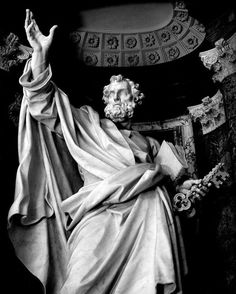 black and white photograph of the statue of st peter