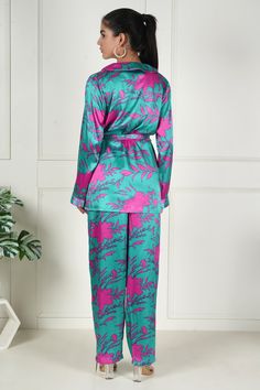 Dive into sophistication with our Aqua Blush Satin Floral Co-ord Set. This exquisite ensemble combines the serenity of aqua with the playfulness of pink in a luxurious satin fabric adorned with a delicate floral print. Let your style blossom with the delicate floral print, adding a touch of fantasy to your wardrobe. It’s a celebration of femininity and fashion. The model in the image is wearing a size M for your reference. Elegant Pink Loungewear Set, Pink Satin Loungewear Sets, Pink Silk Floral Print Sets, Green Satin Summer Set, Green Satin Set For Summer, Green Satin Sets For Summer, Elegant Pink Printed Set, Pink Satin Pajama Party Sets, Pink Floral Print Loungewear Sets