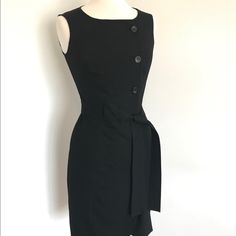 New, Without Tags. Wrong Size, Never Worn. Faux Button Down Off To The Wearer’s Left Side, But Actual Closure Is A Left Side Zipper. Attached Belt. High Quality Materials, Well Made. Perfect Condition. Black Dress With Side Buttons For Work, Black Dresses With Side Buttons For Work, Black Workwear Dress With Side Buttons, Fitted Dress With Button Back For Work, Black Button-back Dress For Work, Black Workwear Dress With Button Back, Black Work Dress With Button Back, Black Office Dress With Button Closure, Black Office Wear Dress With Button Closure