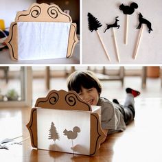 a kid laying on the floor next to some cutouts and other items that are made out of wood