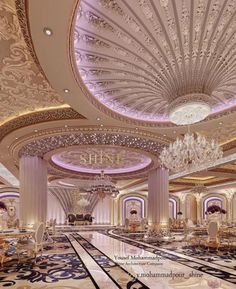 an elaborately decorated ballroom with chandeliers and tables