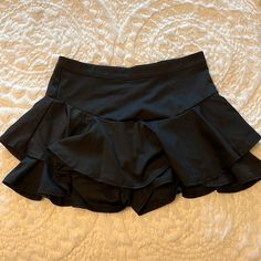 Skirt With Shorts Underneath/ Size L/ New/ Never Worn/ Smoke And Pet Free Home:) Skirts With Shorts Underneath, Stretch Mini Skirt For Party, Party Mini Skirt With Stretch, High Waist Skirt With Built-in Shorts For Night Out, High-waist Skirt With Built-in Shorts For Night Out, High Waist Stretch Bottoms With Ruffled Skirt, High Waist Skirt With Built-in Shorts For Party, Stretch Ruffled Skort For Night Out, Chic Skirted Swim Skirt For Party